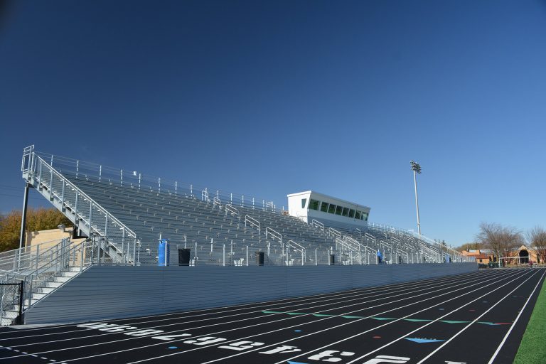 Home side bleachers press box and track