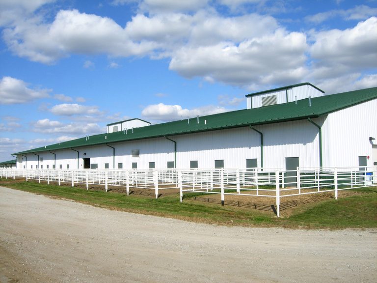 White and green exterior with animal pens